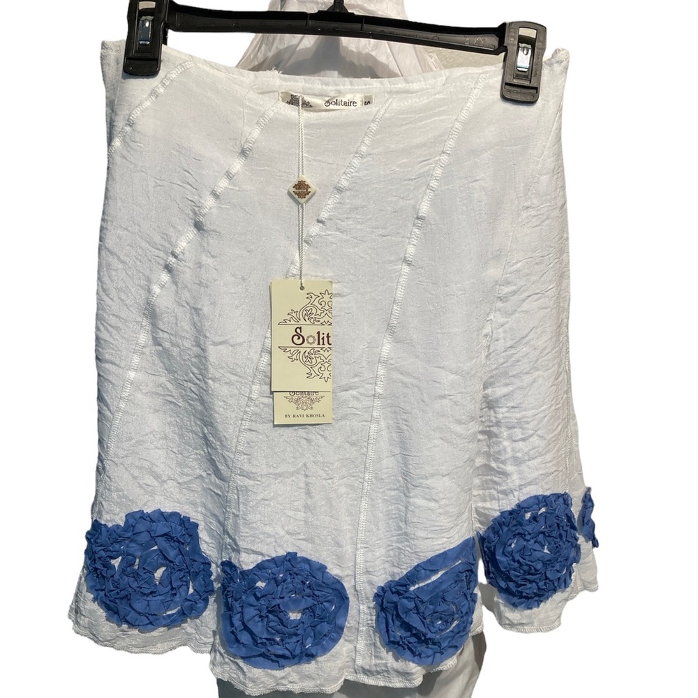 - - - Solitaire white shirt blue ruffle floral on hemline NEW with TAG cot…